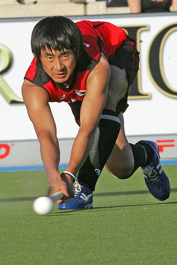 &copy; Herbert Bohlscheid (www.sportfoto.tv) / Wolfgang Quednau (www.hockeyimage.net)